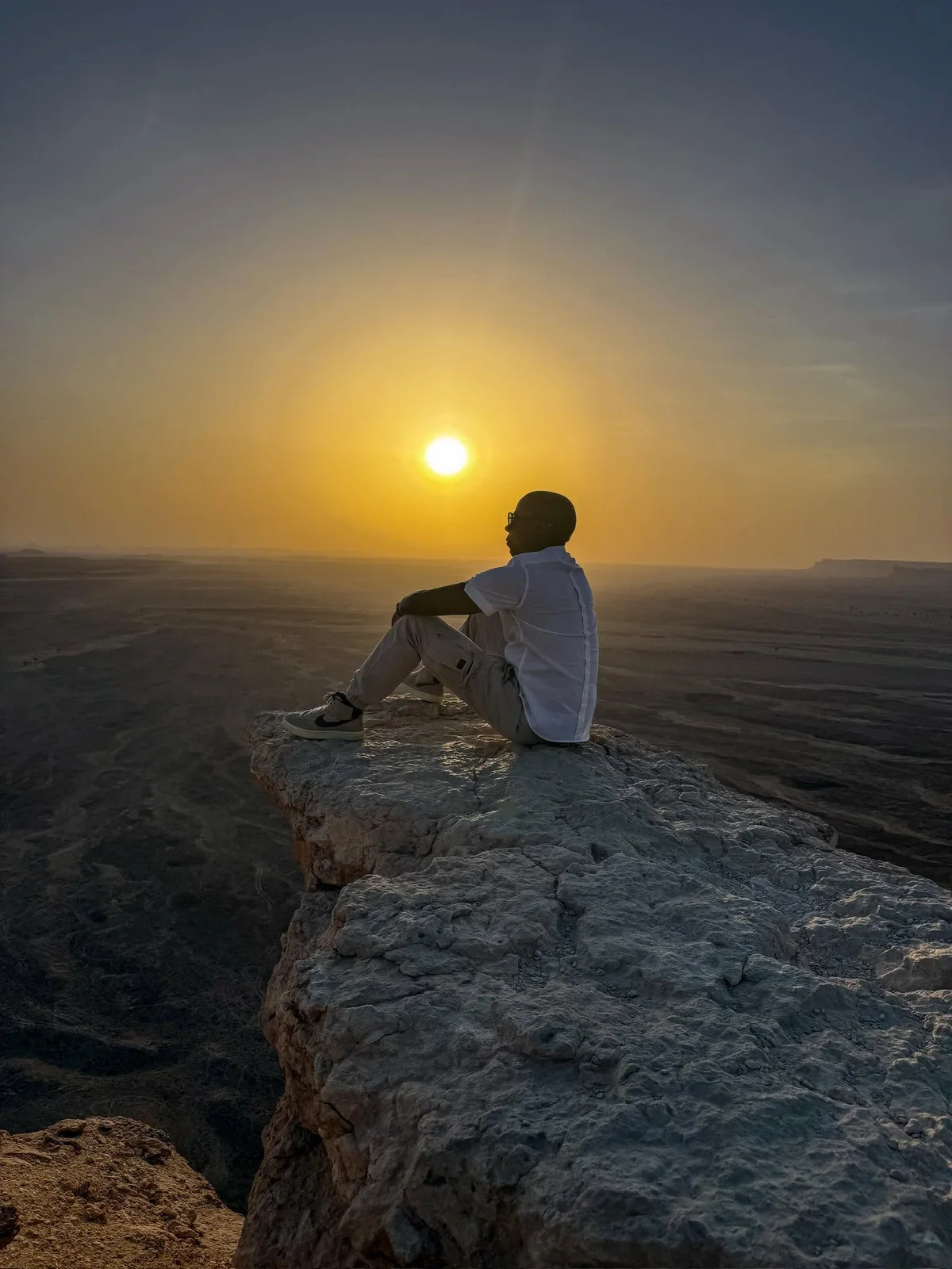 Shannon Allen at the Edge of the World escarpment outside Riyadh