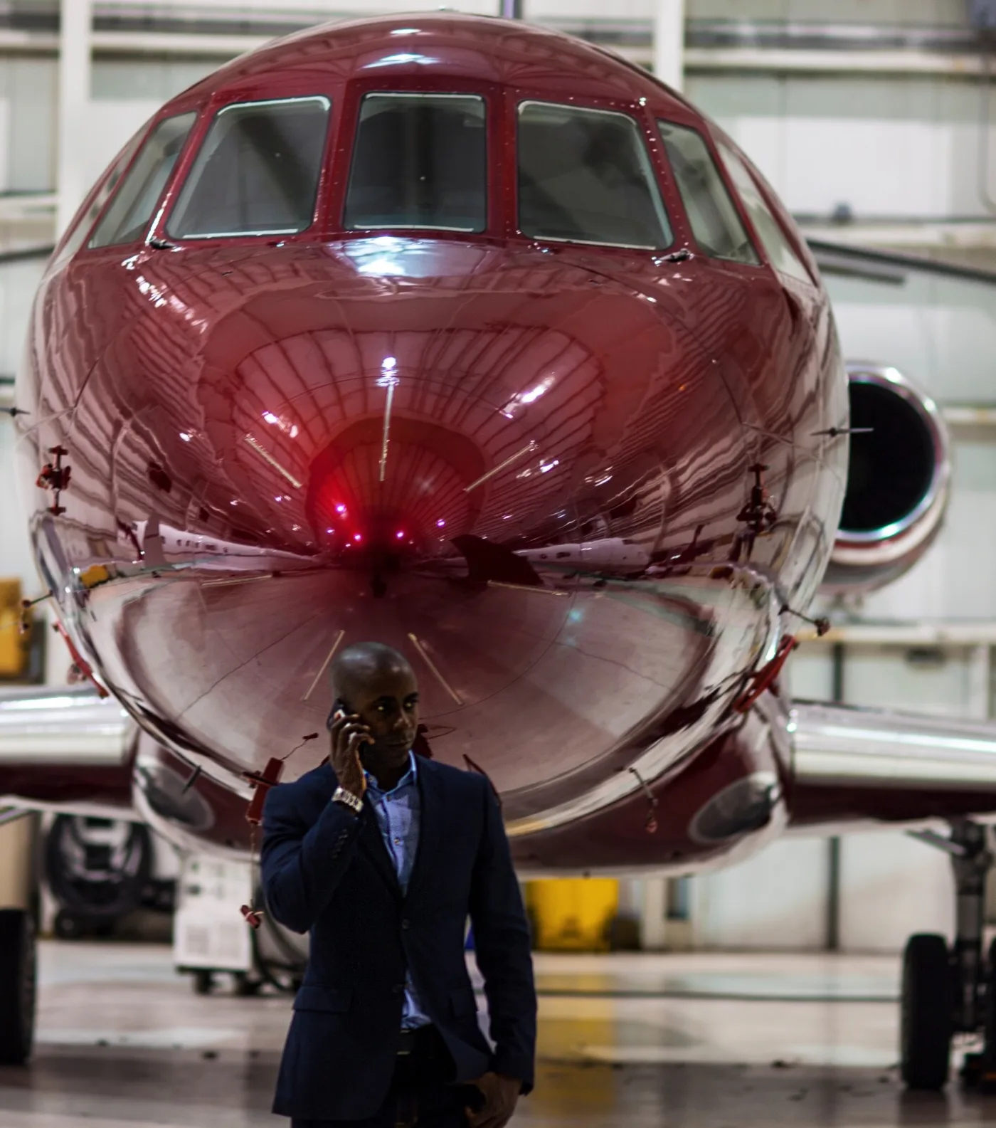 Shannon Allen in front of a red aircraft