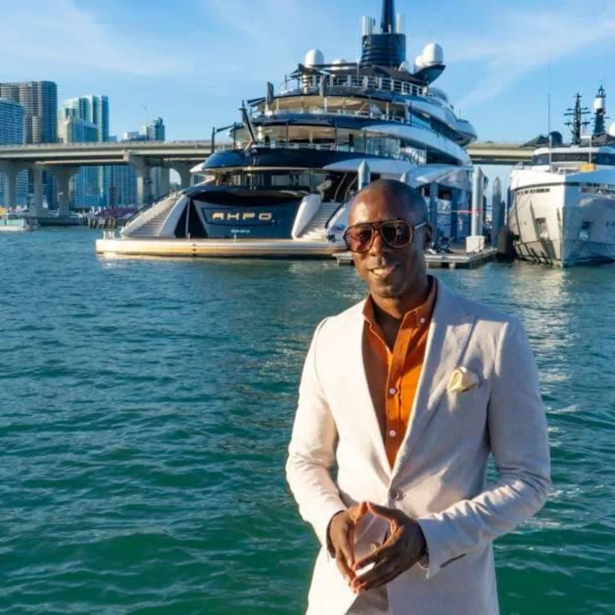 Shannon Allen standing near a yacht